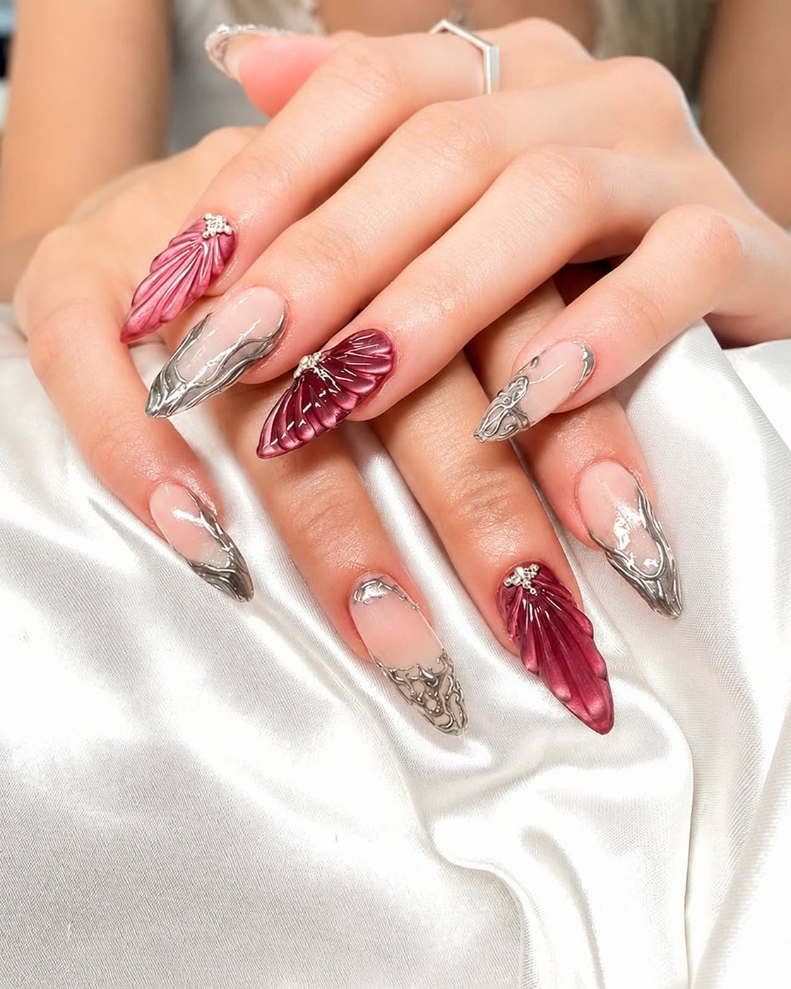 Burgundy 3D floral fan nail art by My Royal Nails & Spa in Humble, TX